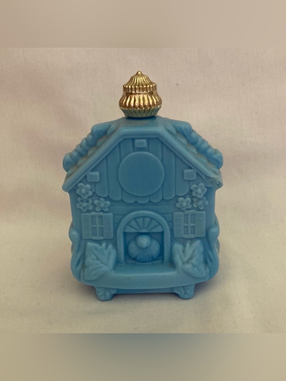 Avon collectables Blue milk glass cologne bottle